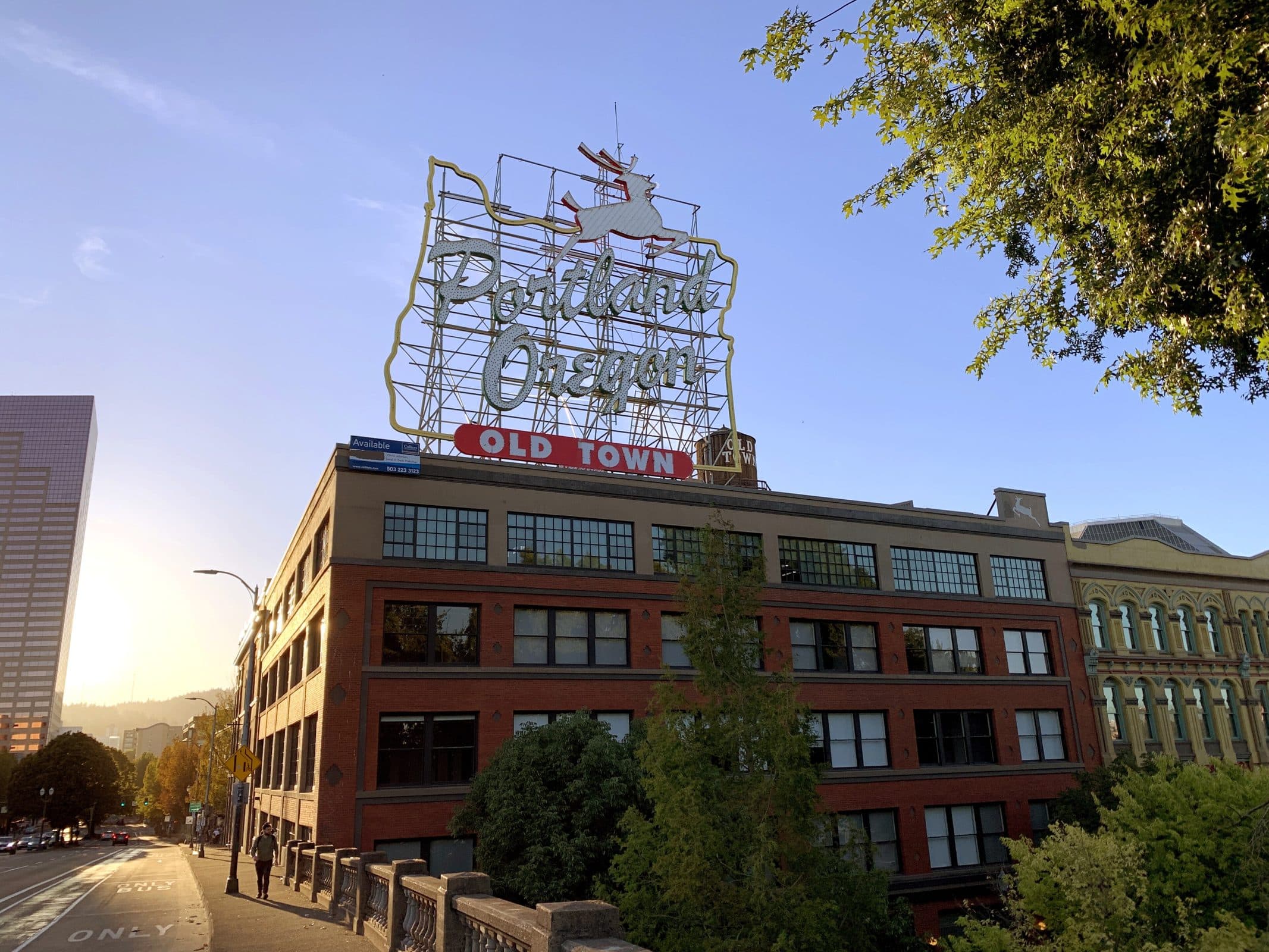 Iconic Portland White Stag sign at sunset